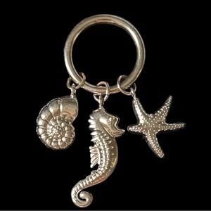Set of 4 Pottery Barn Silver Seahorse Starfish and Seashell Napkin Rings
